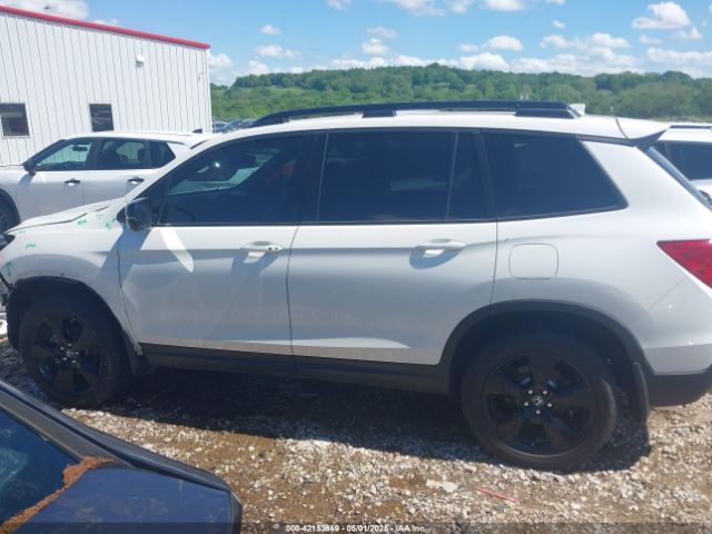 5FNYF8H0XKB000774 Honda Passport Elite