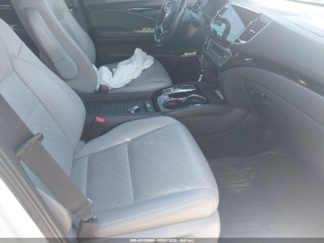5FNYF8H0XKB000774 Honda Passport Elite
