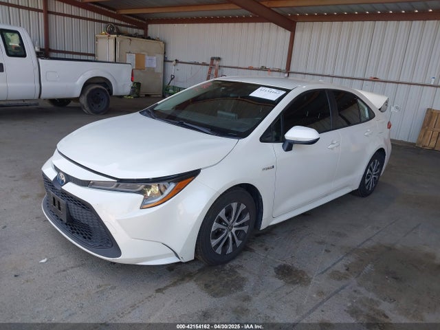 Toyota Corolla Hybrid Le 2021 JTDEAMDEXMJ007022 Image 2