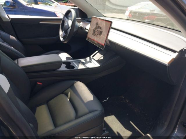 2023 TESLA MODEL Y 7SAYGDEE9PA170556 Photo 4