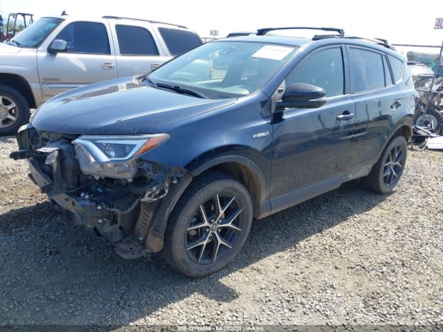 2018 TOYOTA RAV4 HYBRID JTMJJREV9JD191552 Photo 1