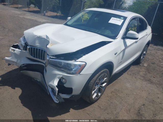 2015 BMW X4 5UXXW5C54F0E88882 Photo 1