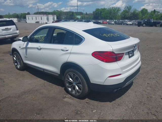 2015 BMW X4 5UXXW5C54F0E88882 Photo 2