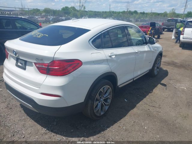 2015 BMW X4 5UXXW5C54F0E88882 Photo 3