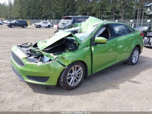 1FADP3F28JL323242 Ford FOCUS SE