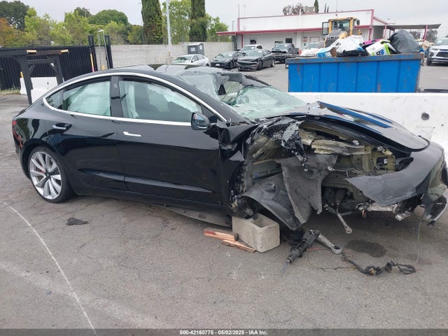 5YJ3E1EB5KF434613 Tesla 2019