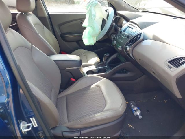 KM8JU3AGXEU802833 Hyundai TUCSON SE