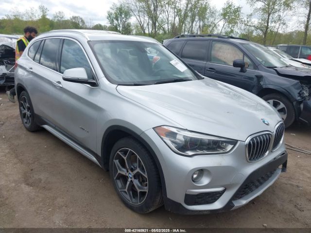 2017 BMW X1 WBXHT3Z38H4A58246
