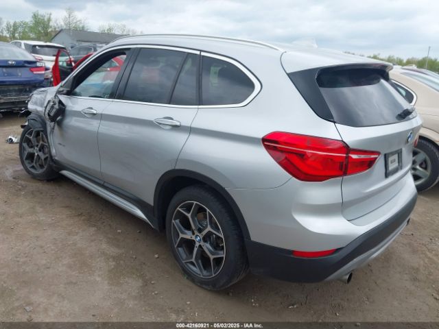 2017 BMW X1 WBXHT3Z38H4A58246 Photo 2