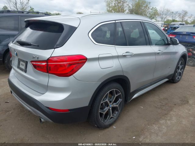 2017 BMW X1 WBXHT3Z38H4A58246 Photo 3