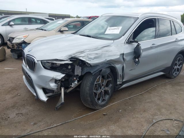 2017 BMW X1 WBXHT3Z38H4A58246 Photo 5