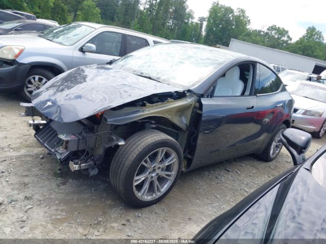 2023 TESLA MODEL Y 7SAYGDEE1PA166355 Photo 1