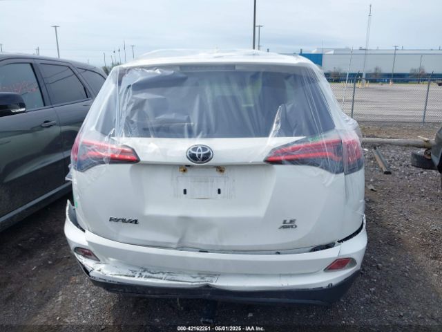 JTMBFREV9JJ200726 Toyota RAV4 LE