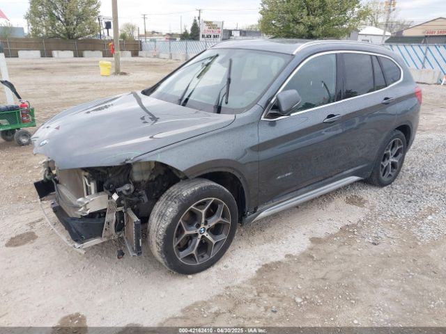 2017 BMW X1 WBXHT3C33H5F76171 Photo 1