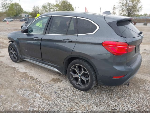 2017 BMW X1 WBXHT3C33H5F76171 Photo 2