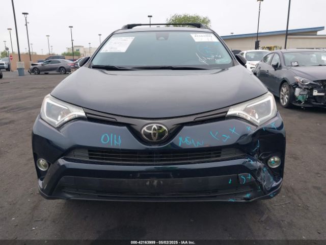 JTMZFREV5JD109515 Toyota RAV4 LE