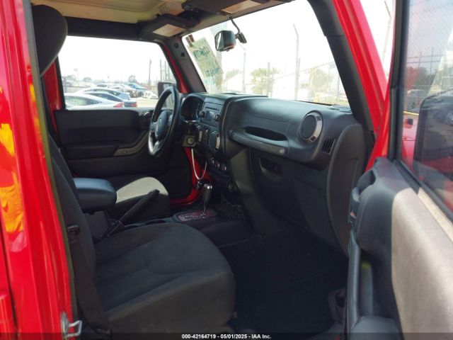 1C4BJWDGXGL174327 Jeep Wrangler Unlimited Sport