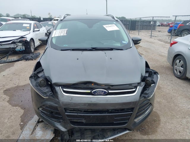 Продажа на аукционе авто 2016 Ford Escape Titanium, vin: 1FMCU0J98GUC10097, номер лота: 42166133