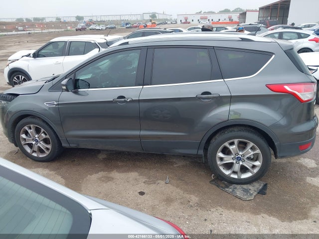 Продажа на аукционе авто 2016 Ford Escape Titanium, vin: 1FMCU0J98GUC10097, номер лота: 42166133