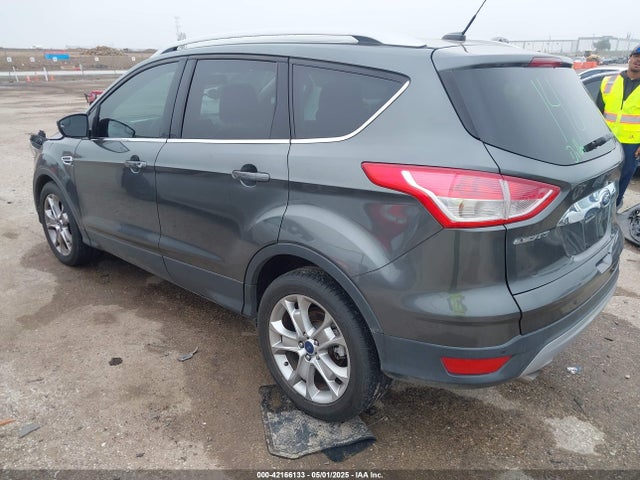 Продажа на аукционе авто 2016 Ford Escape Titanium, vin: 1FMCU0J98GUC10097, номер лота: 42166133