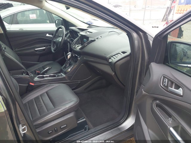 Продажа на аукционе авто 2016 Ford Escape Titanium, vin: 1FMCU0J98GUC10097, номер лота: 42166133