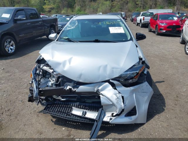 2T1BURHE9JC110134 Toyota COROLLA LE