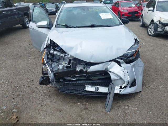 2T1BURHE9JC110134 Toyota COROLLA LE