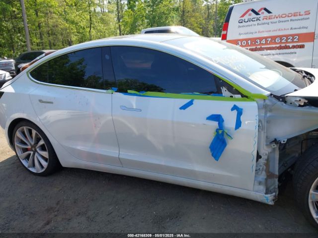 5YJ3E1EB0JF151499 Tesla 2018