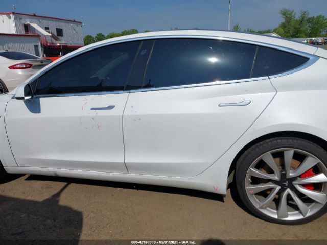 5YJ3E1EB0JF151499 Tesla 2018