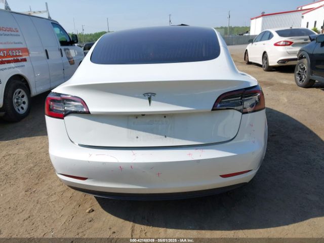 5YJ3E1EB0JF151499 Tesla 2018