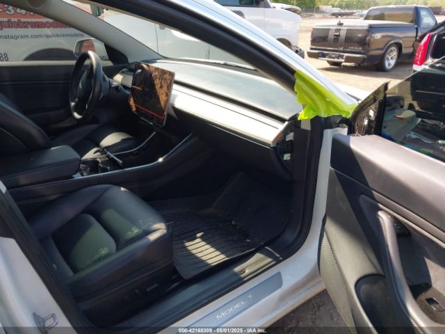 5YJ3E1EB0JF151499 Tesla 2018