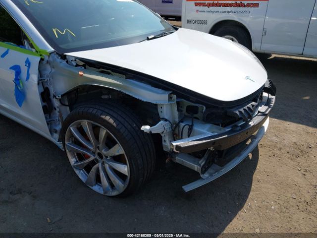 5YJ3E1EB0JF151499 Tesla 2018