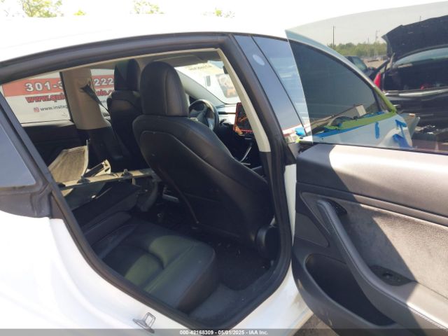 5YJ3E1EB0JF151499 Tesla 2018