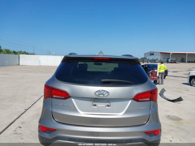 5NMZU3LB2HH047200 Hyundai Santa Fe Sport 2.4l