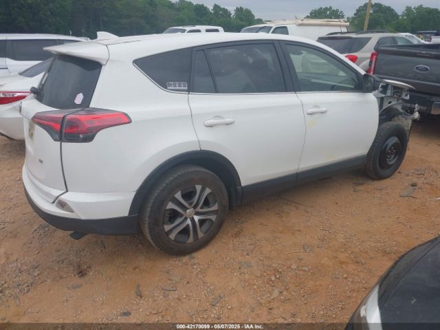 JTMZFREV5JJ173636 Toyota RAV4 LE