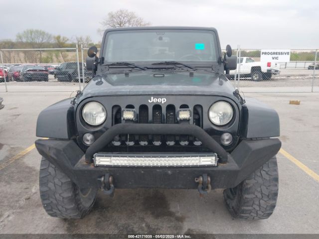 1C4BJWEG2EL122962 Jeep Wrangler Unlimited Sahara