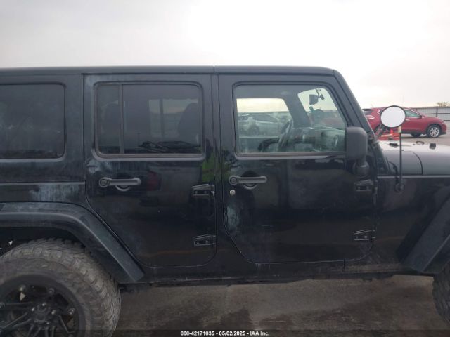 1C4BJWEG2EL122962 Jeep Wrangler Unlimited Sahara