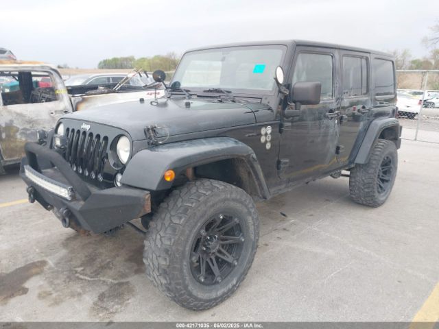1C4BJWEG2EL122962 Jeep Wrangler Unlimited Sahara