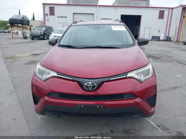 JTMZFREV2JD118088 Toyota RAV4 LE