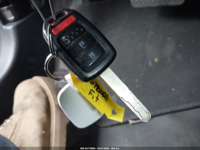 JHMGK5H59GS009556 Honda FIT LX
