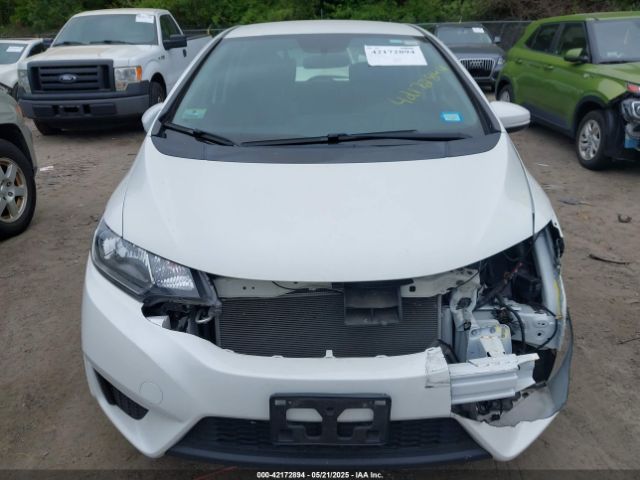 JHMGK5H59GS009556 Honda FIT LX