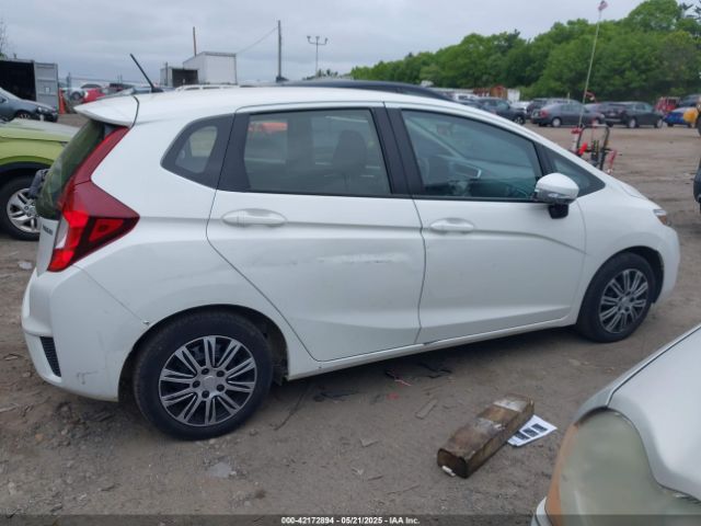 JHMGK5H59GS009556 Honda FIT LX