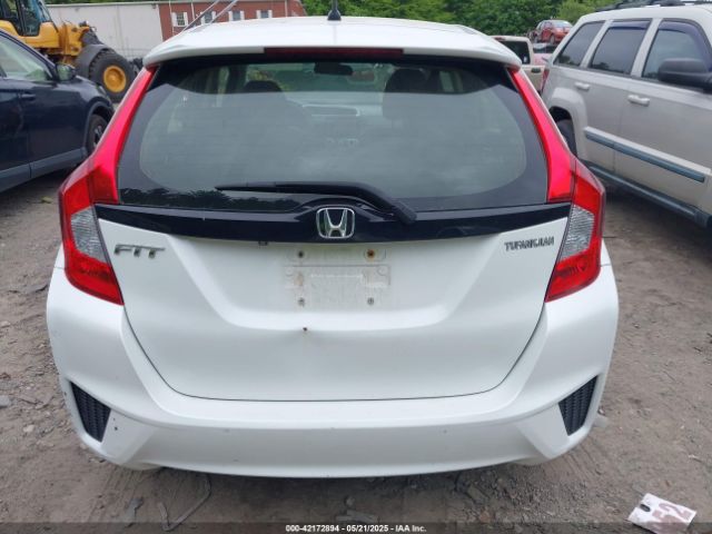 JHMGK5H59GS009556 Honda FIT LX