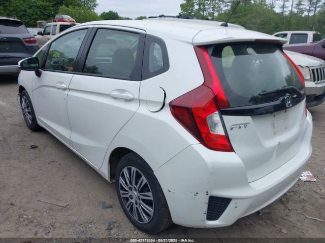 JHMGK5H59GS009556 Honda FIT LX