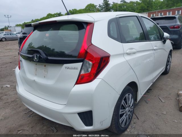 JHMGK5H59GS009556 Honda FIT LX
