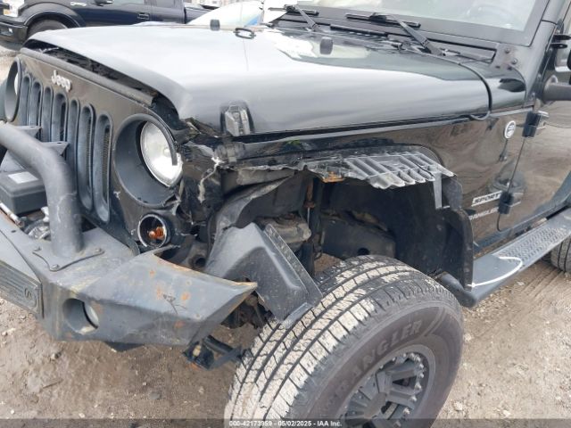 1C4AJWAG2FL500717 Jeep Wrangler Sport