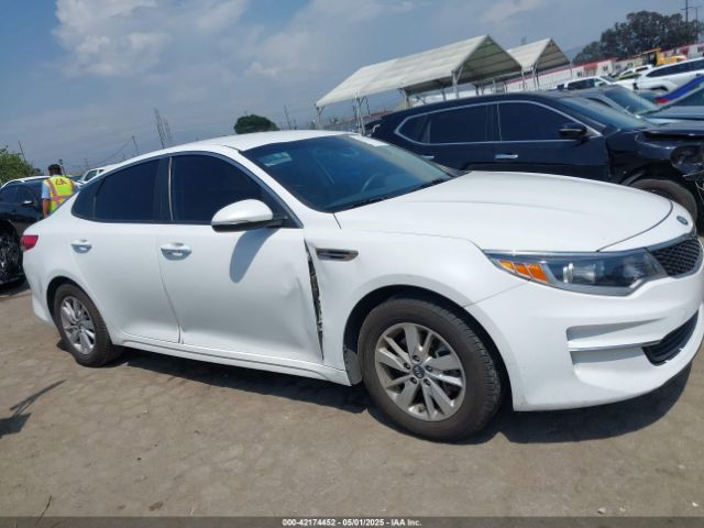 KNAGT4L3XJ5216216 KIA Optima Lx
