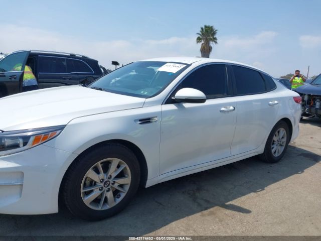 KNAGT4L3XJ5216216 KIA Optima Lx