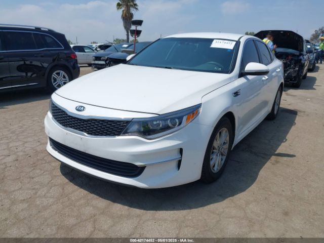 KNAGT4L3XJ5216216 KIA Optima Lx