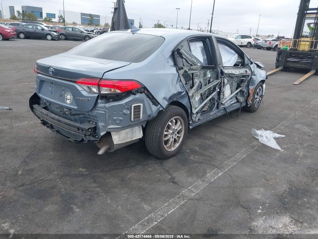 Toyota Corolla Hybrid Le 2021 JTDEAMDE7MJ020682 Image 4